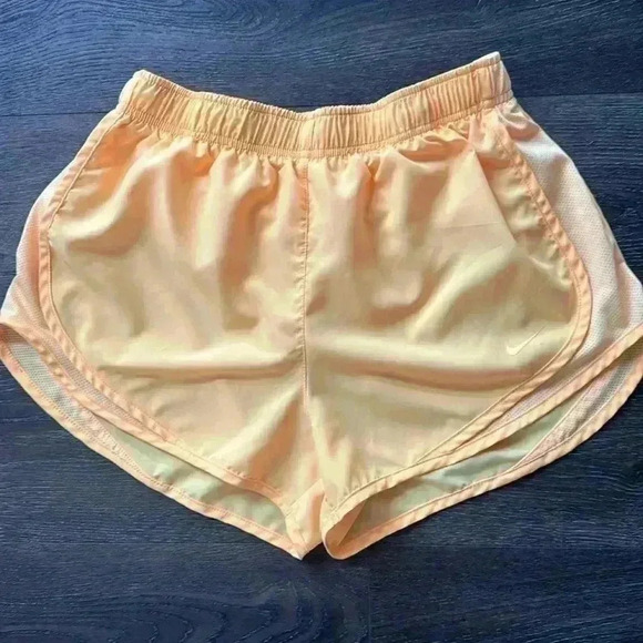Nike Dri-Fit Shorts.  Women’s size medium. Very cute yellow color! - Picture 1 of 5